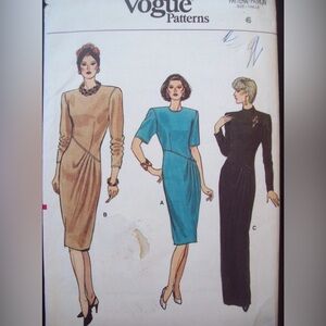 Vintage Vogue Pattern 9779 
Shaped Bodice Dress 
Size 6 
Uncut Factory Fold  NOS